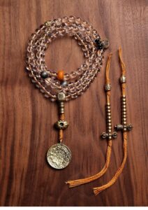 Tibetan Sacred White Crystal Mala (108 Beads) with Nine-Palace Shield and Amber-Style Accents, a Longevity Amulet.
