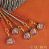 Himalayan Guardian: Hand-Painted Miniature Thangka of Five Wealth Deities Car Charm