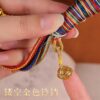 Himalayan Guardian: Hand-Painted Miniature Thangka of Five Wealth Deities Car Charm